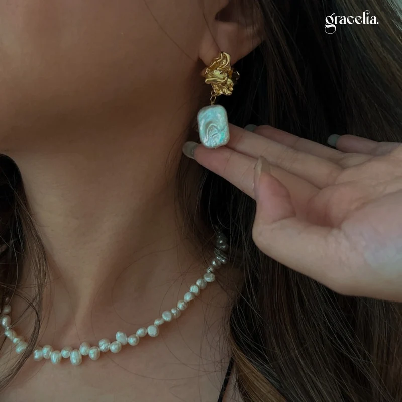 The Best Luminous Lava Stone Pearl Drop Earrings: How They Add a Touch of Untamed Beauty to Any Outfit! - Second Image